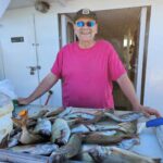 a man holding a crab