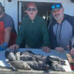 a group of people posing for the camera