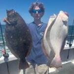 a person holding a fish